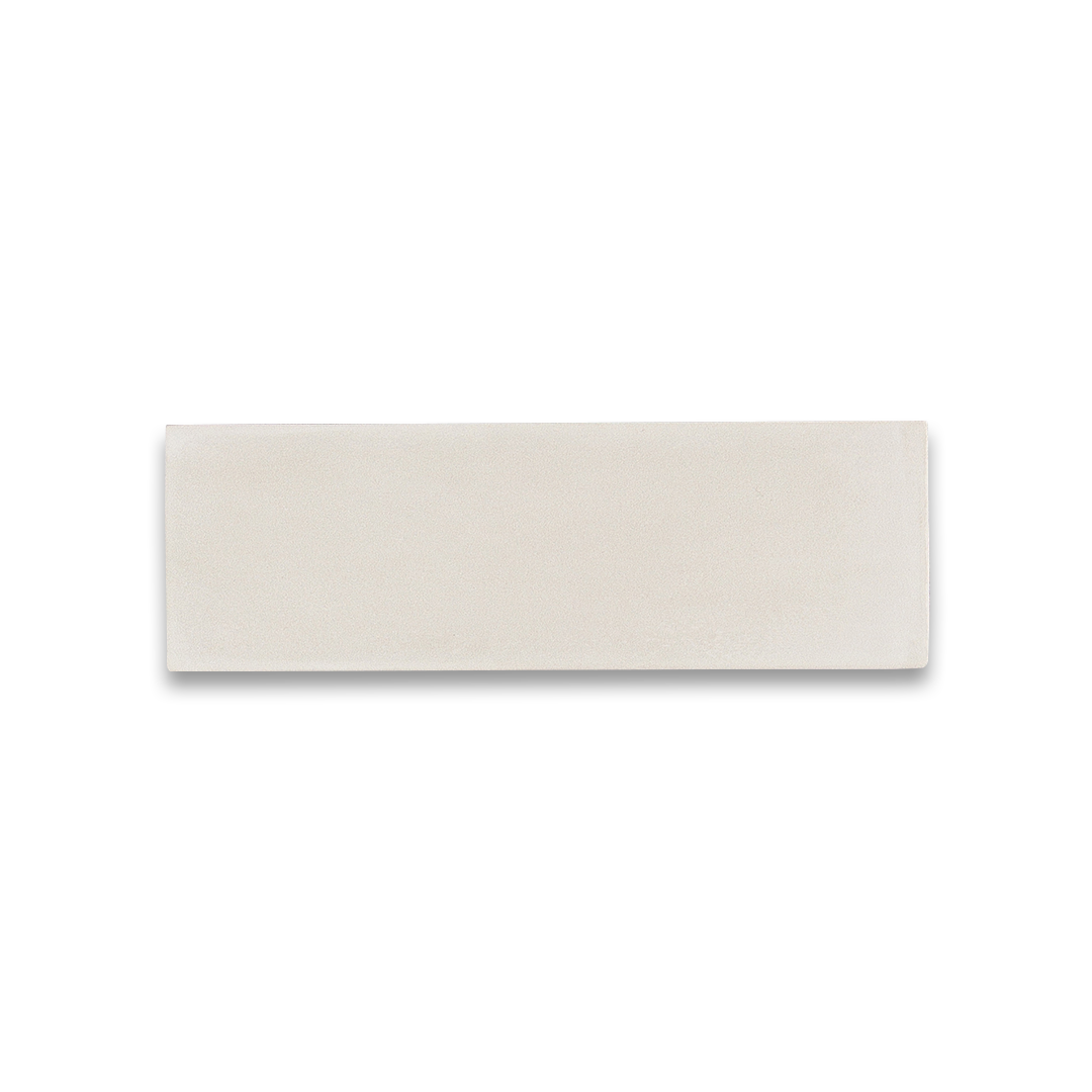 Rectangular beige tile on a white background