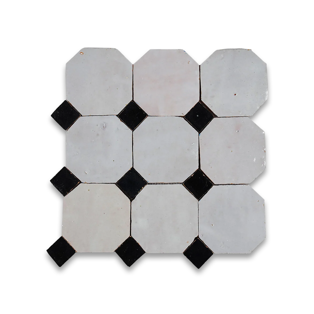 Hexagonal tiles with black diamond patterns on a white background