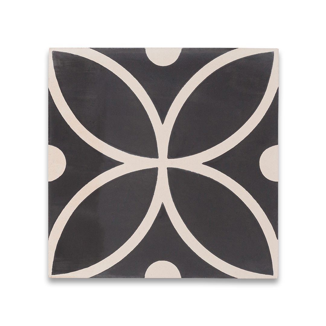 A black and white petal-shaped geometric pattern with circular accents, matte finish, square shape, ideal for modern, vintage, or Mediterranean flooring and wall décor applications.