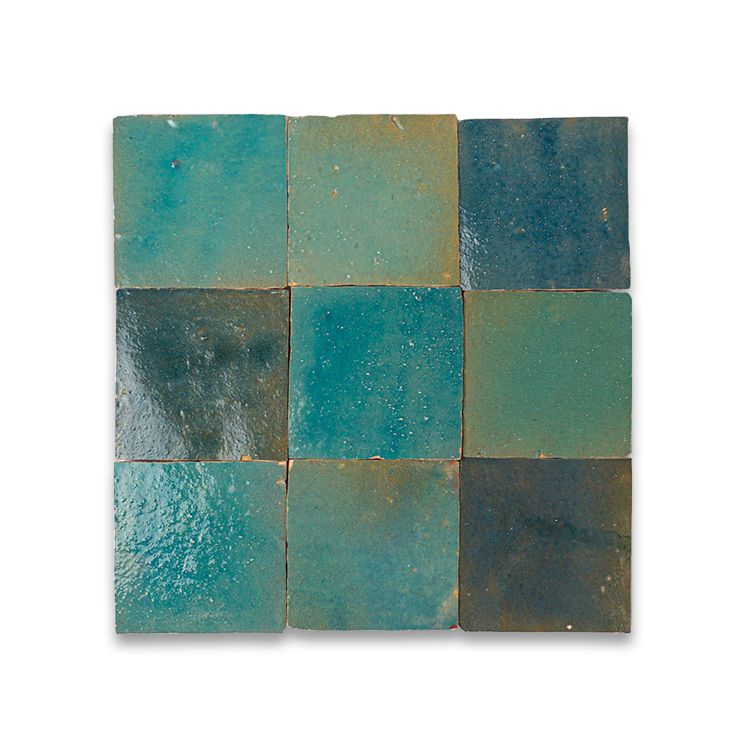 Square tile mosaic with blue and green hues on a white background