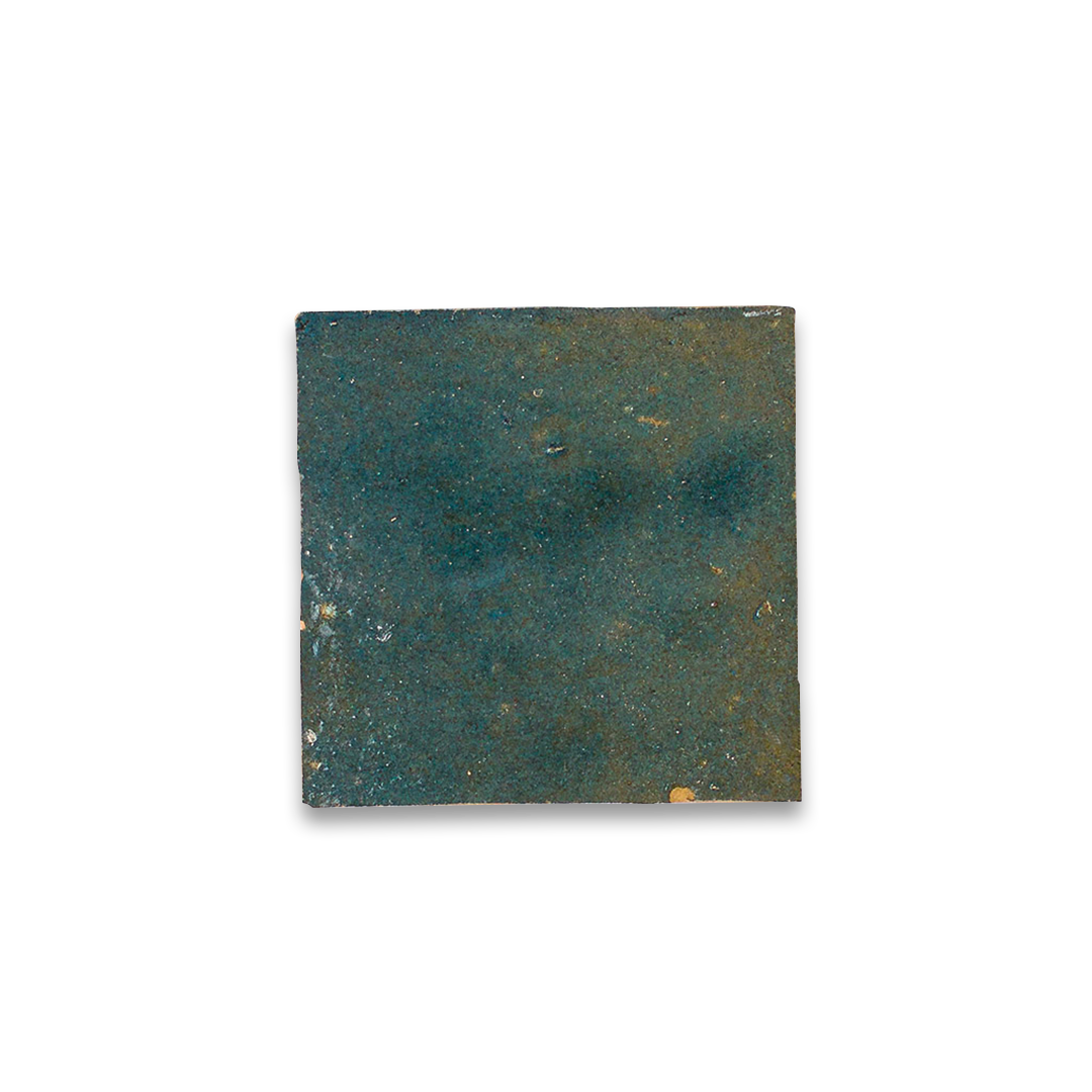 Square ceramic tile with a textured green and brown surface on a white background
