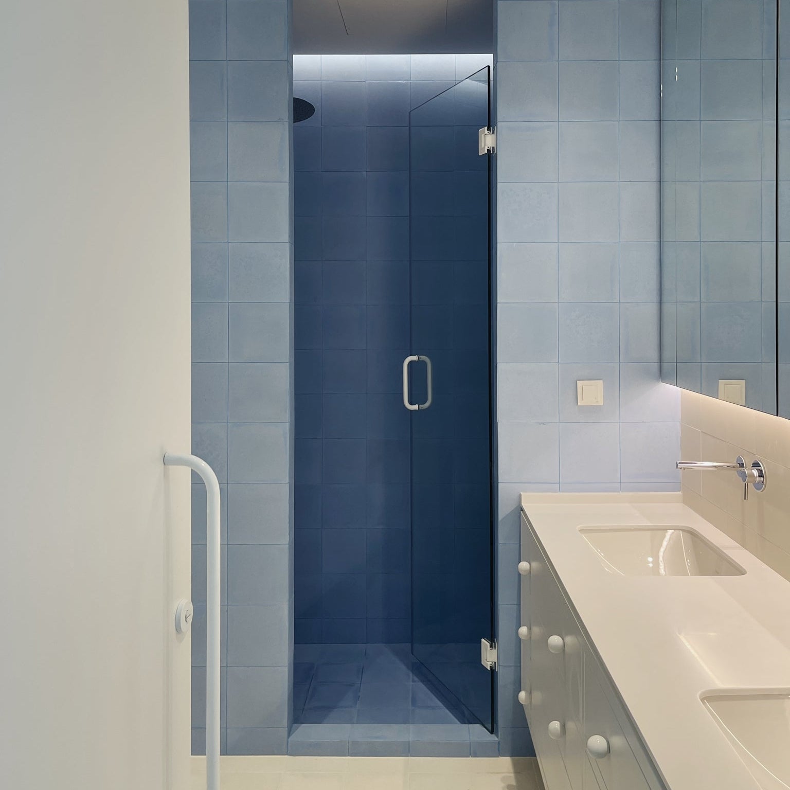 Cement tile featuring a solid pastel sky blue color with a smooth matte finish, handcrafted surface, ideal for coastal, Scandinavian, or contemporary interior flooring and wall décor applications.