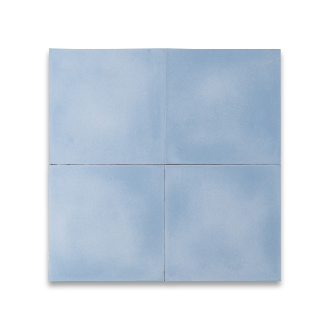 Cement tile featuring a solid pastel sky blue color with a smooth matte finish, handcrafted surface, ideal for coastal, Scandinavian, or contemporary interior flooring and wall décor applications.