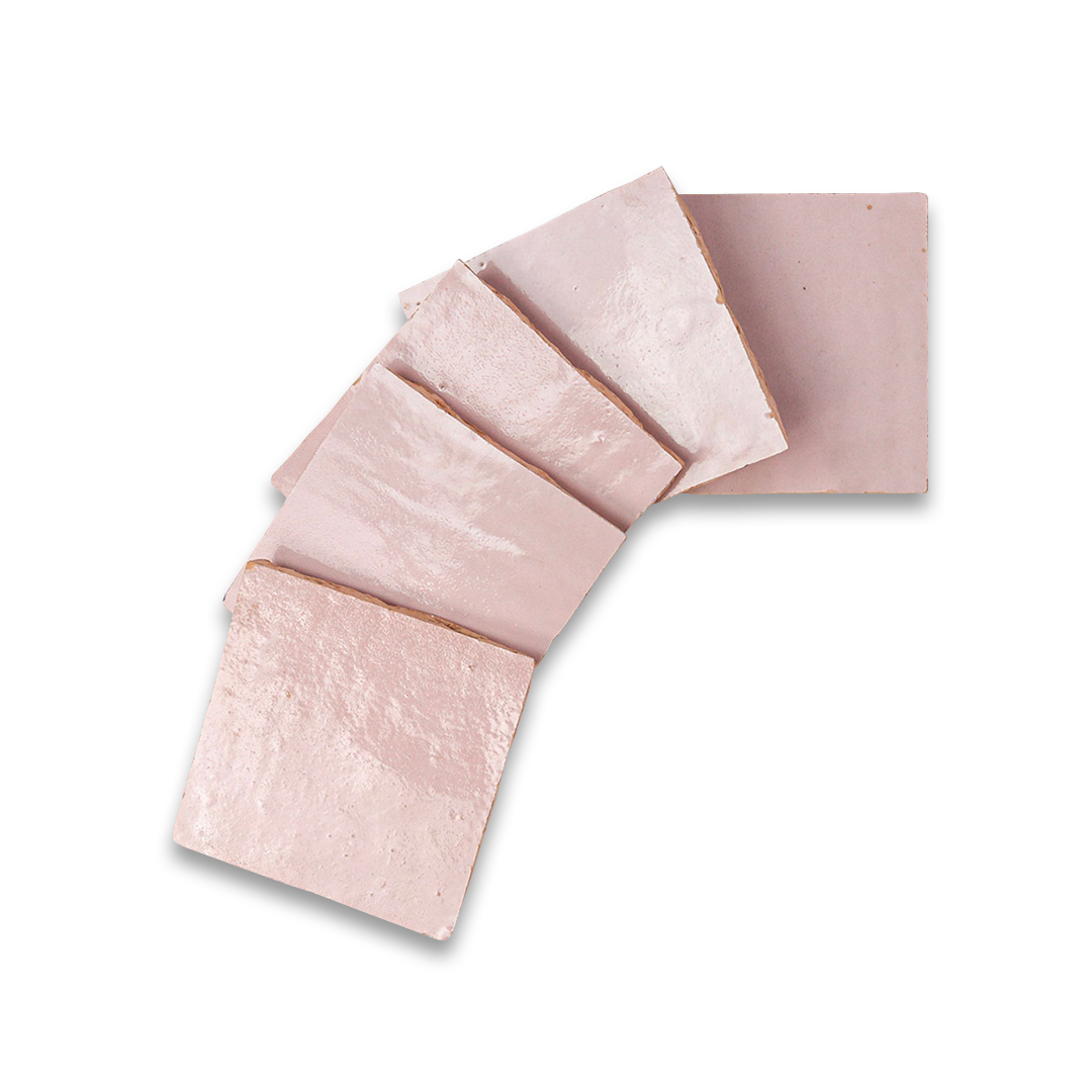 Pink textured soap bars on a white background