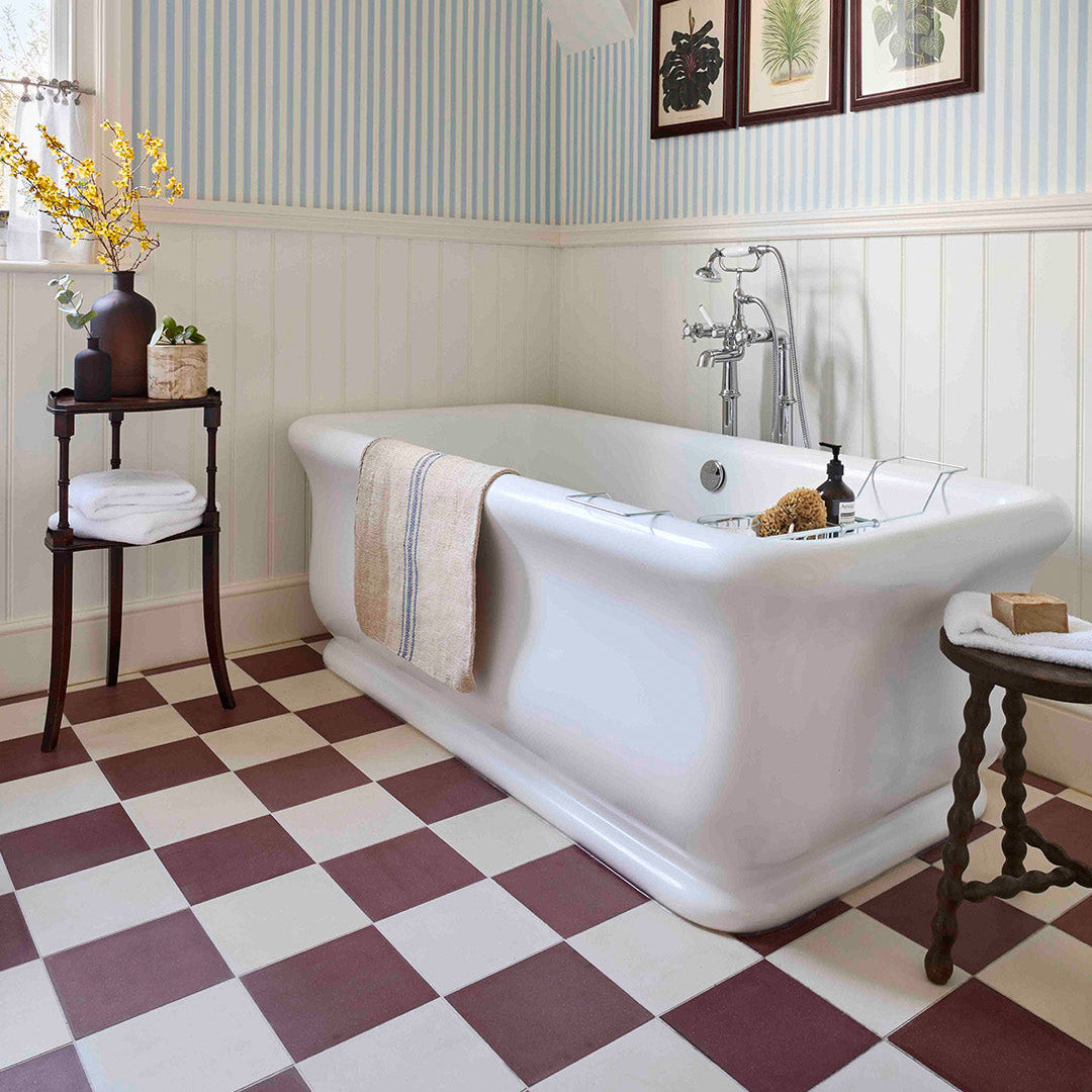 Cement tile featuring a solid burgundy red color with a smooth matte finish, handcrafted surface, ideal for rustic, industrial, or Mediterranean interior flooring and wall décor applications.