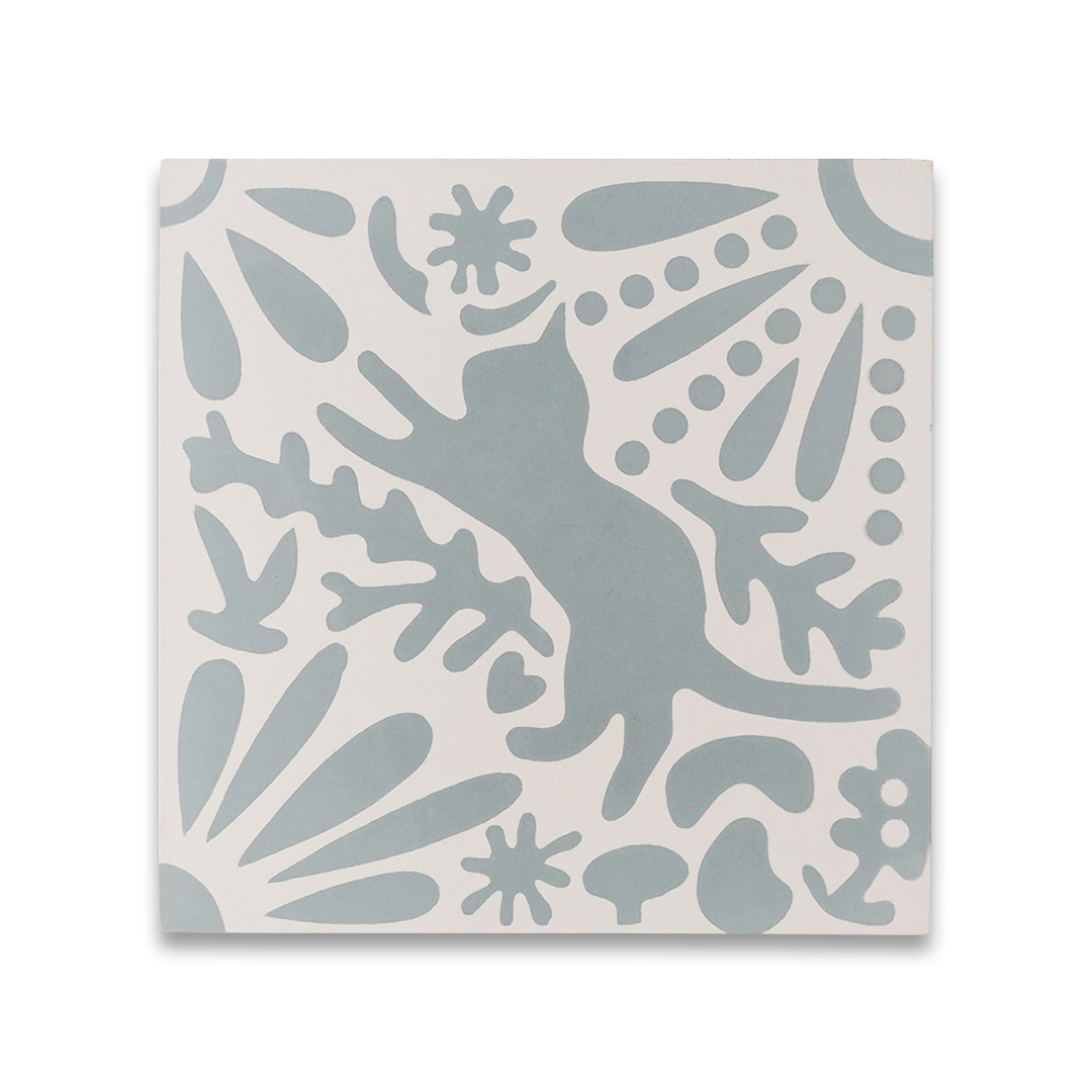 Cement tile featuring a playful cat silhouette surrounded by abstract botanical and geometric shapes in soft gray-blue on a white background, matte finish, ideal for artistic or modern interiors.