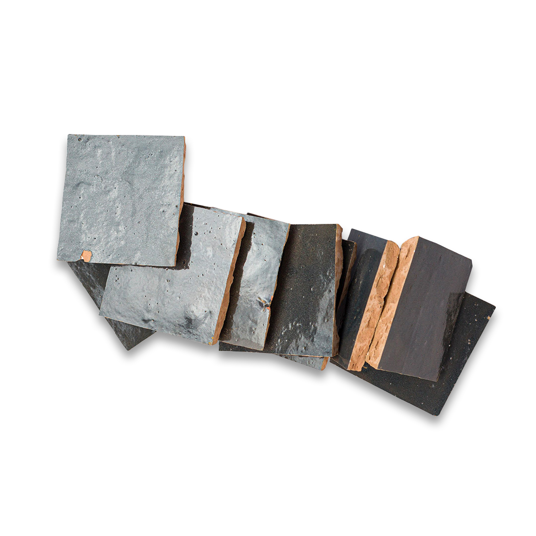 Set of stone coasters with a wooden strip on a white background