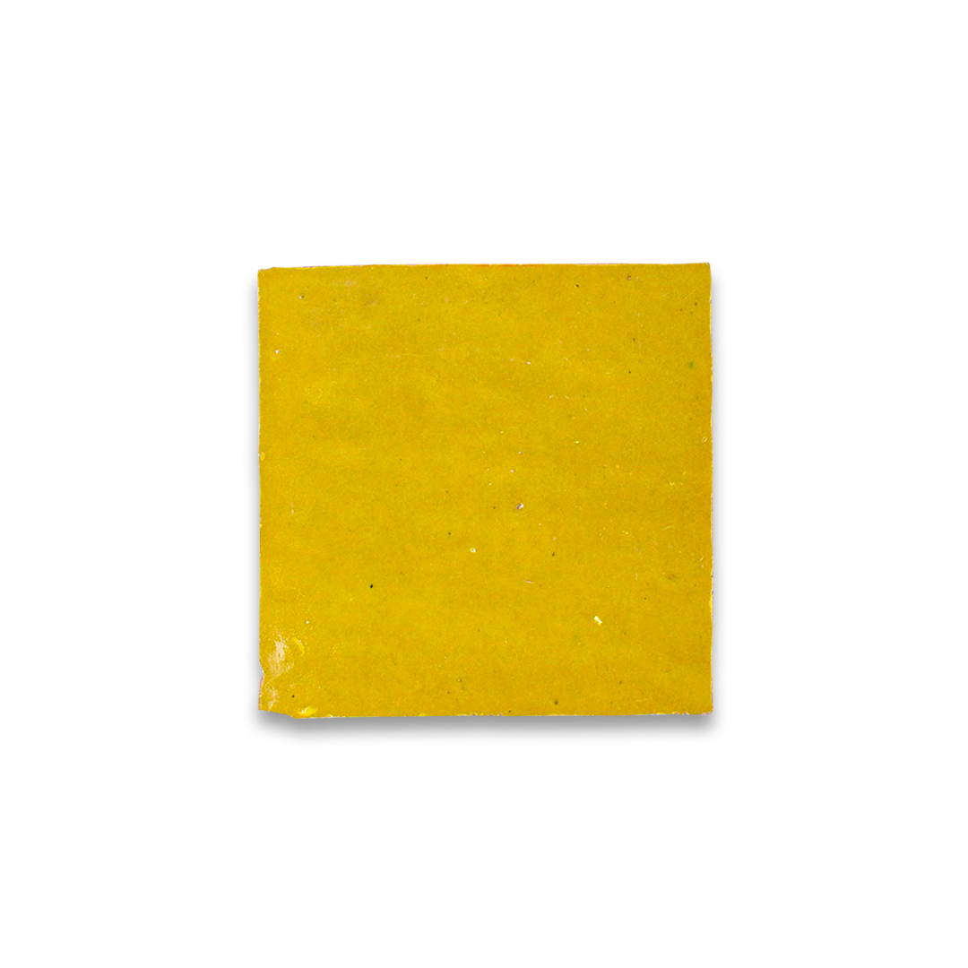 Yellow square tile on a white background