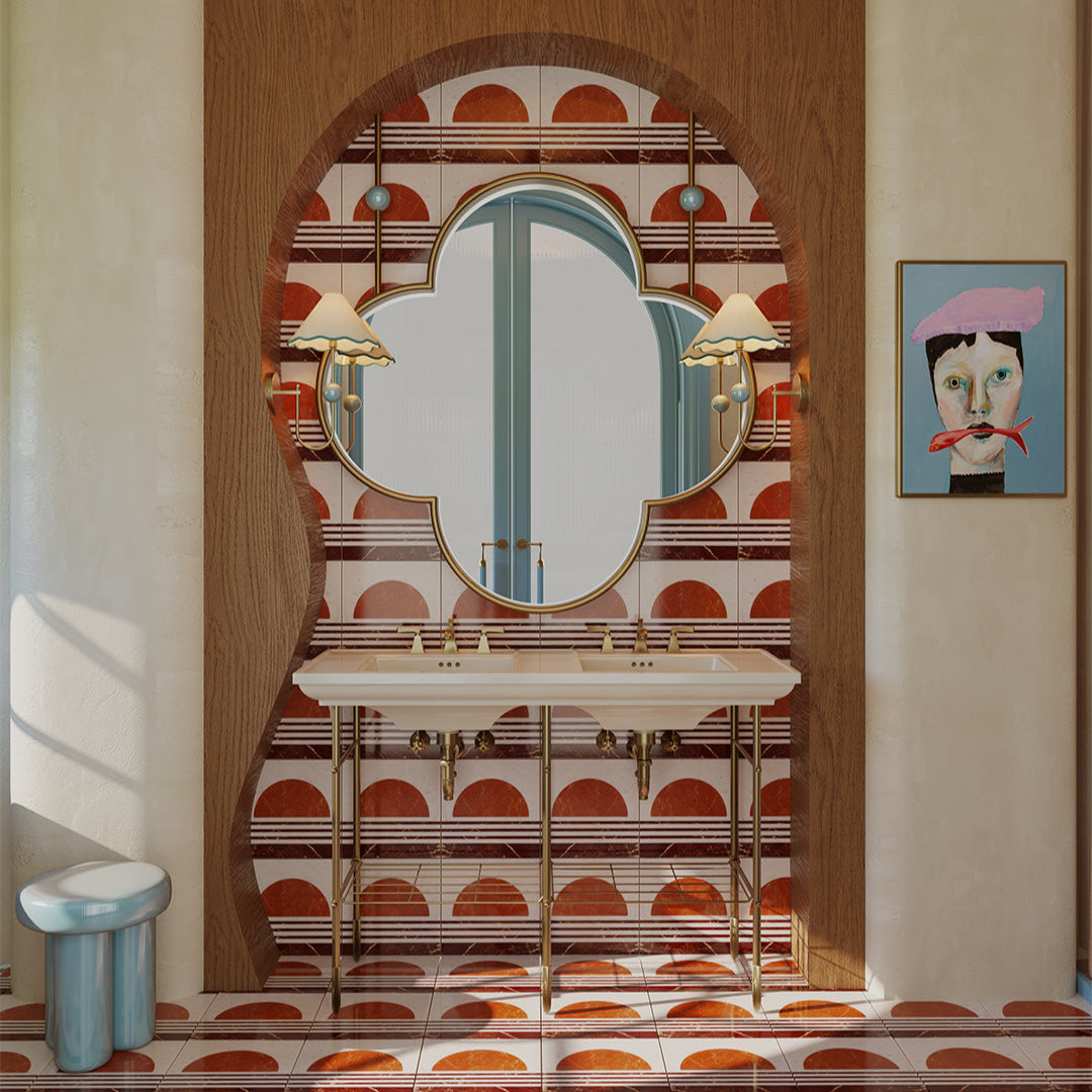 Bathroom with decorative mirror, sink, and wall art