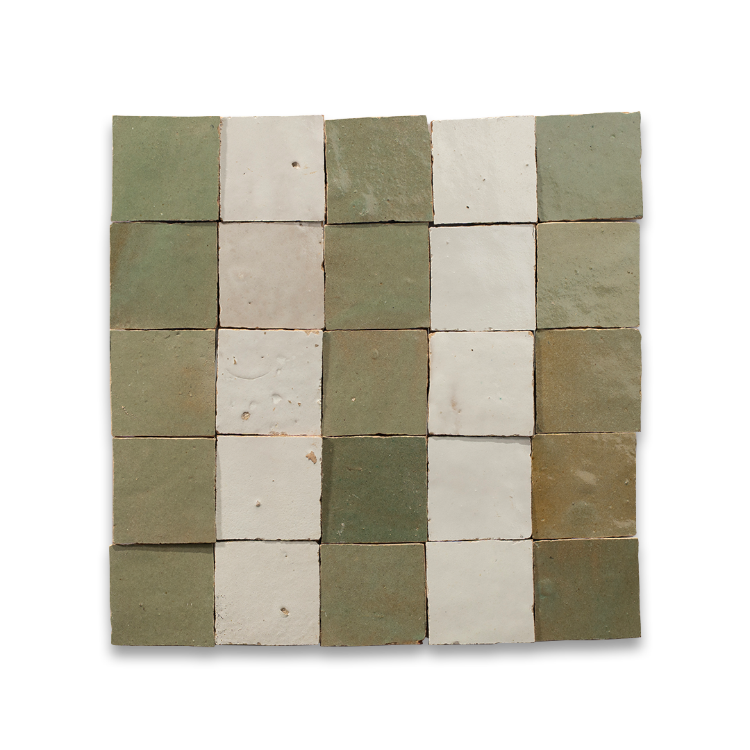 Square arrangement of green and beige ceramic tiles on a white background