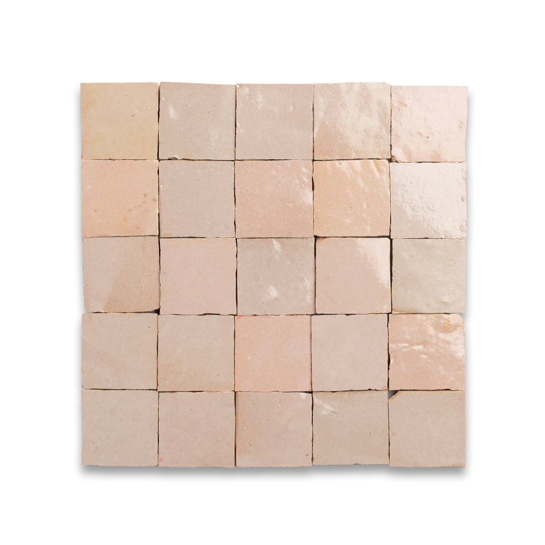 Square arrangement of beige tiles on a white background