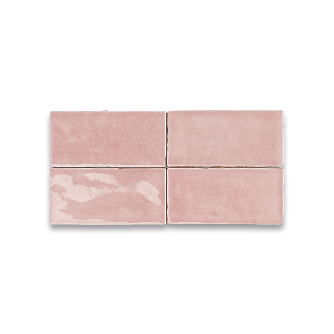 Set of four pink tiles with a subtle pattern on a white background