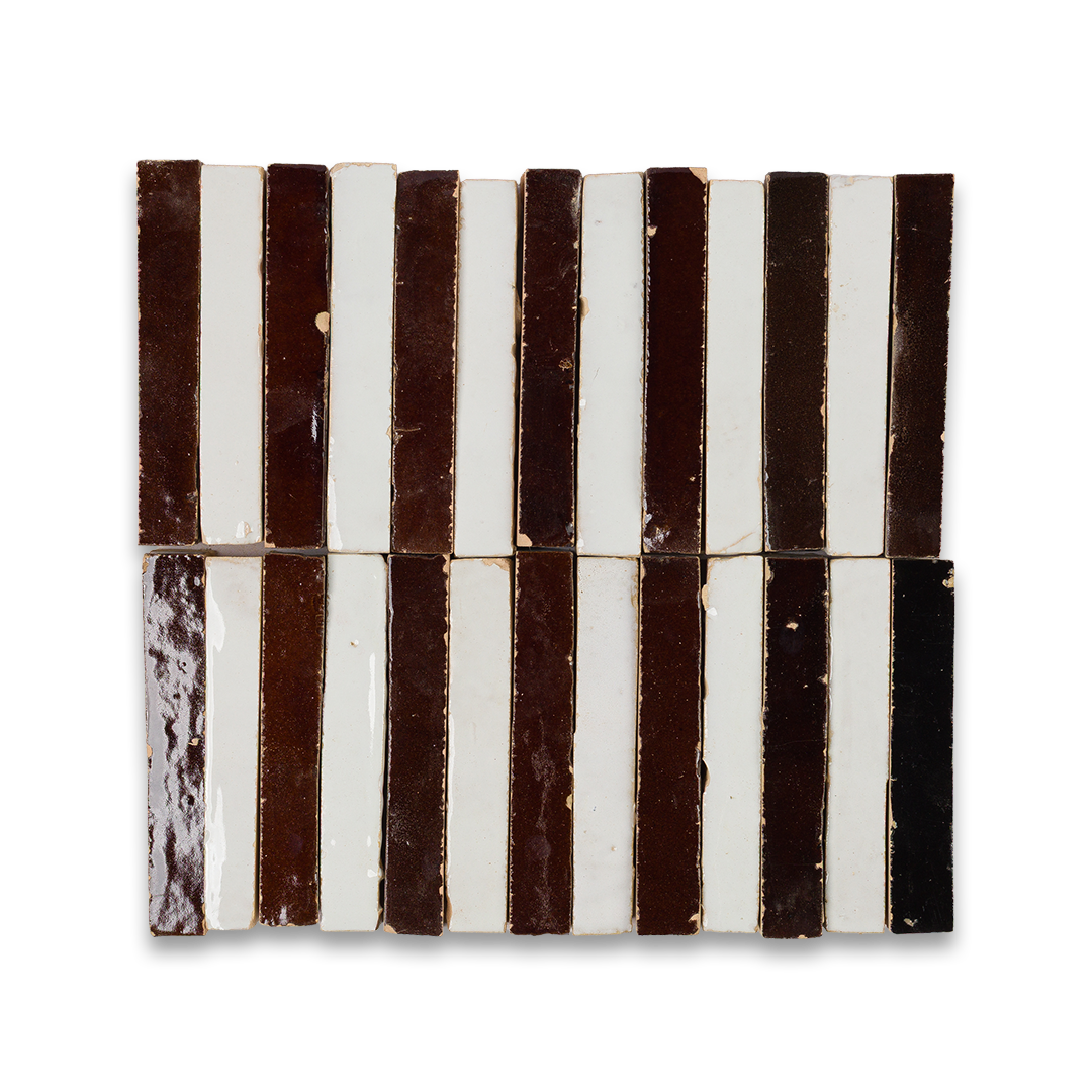 Black and white striped ceramic tiles on a white background