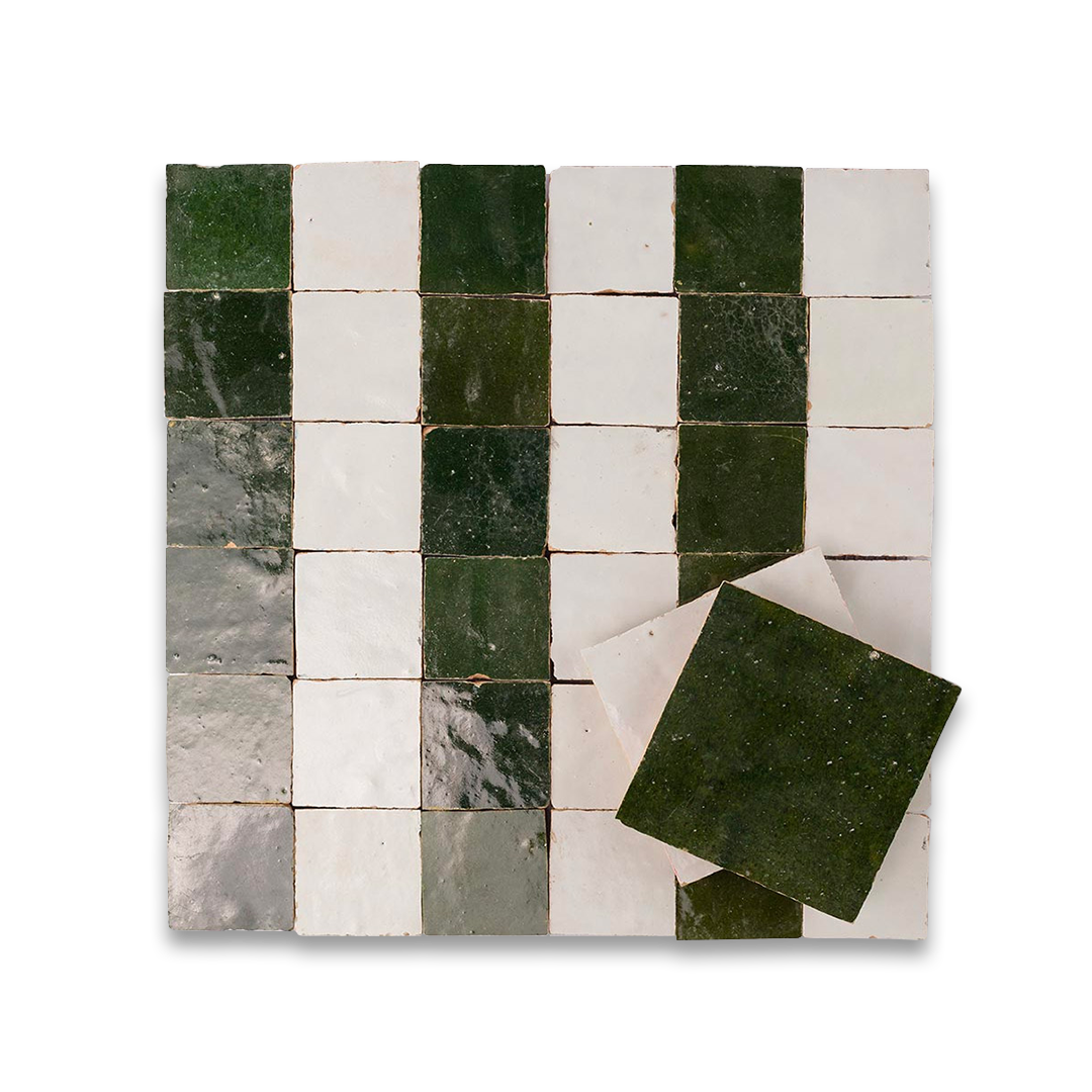 Mosaic pattern of green and white tiles on a white background