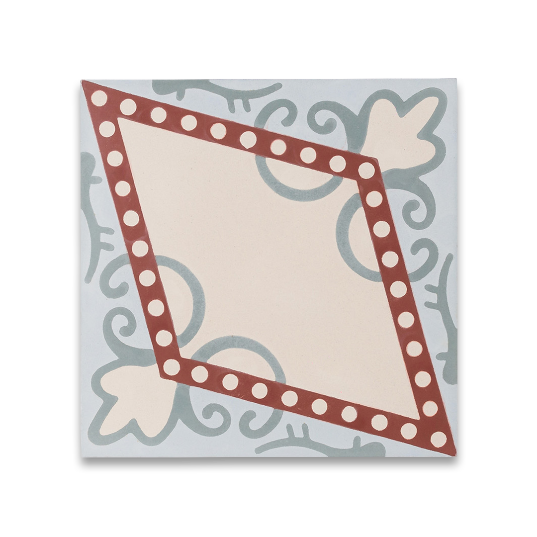 Decorative tile with a polka dot border on a light blue background