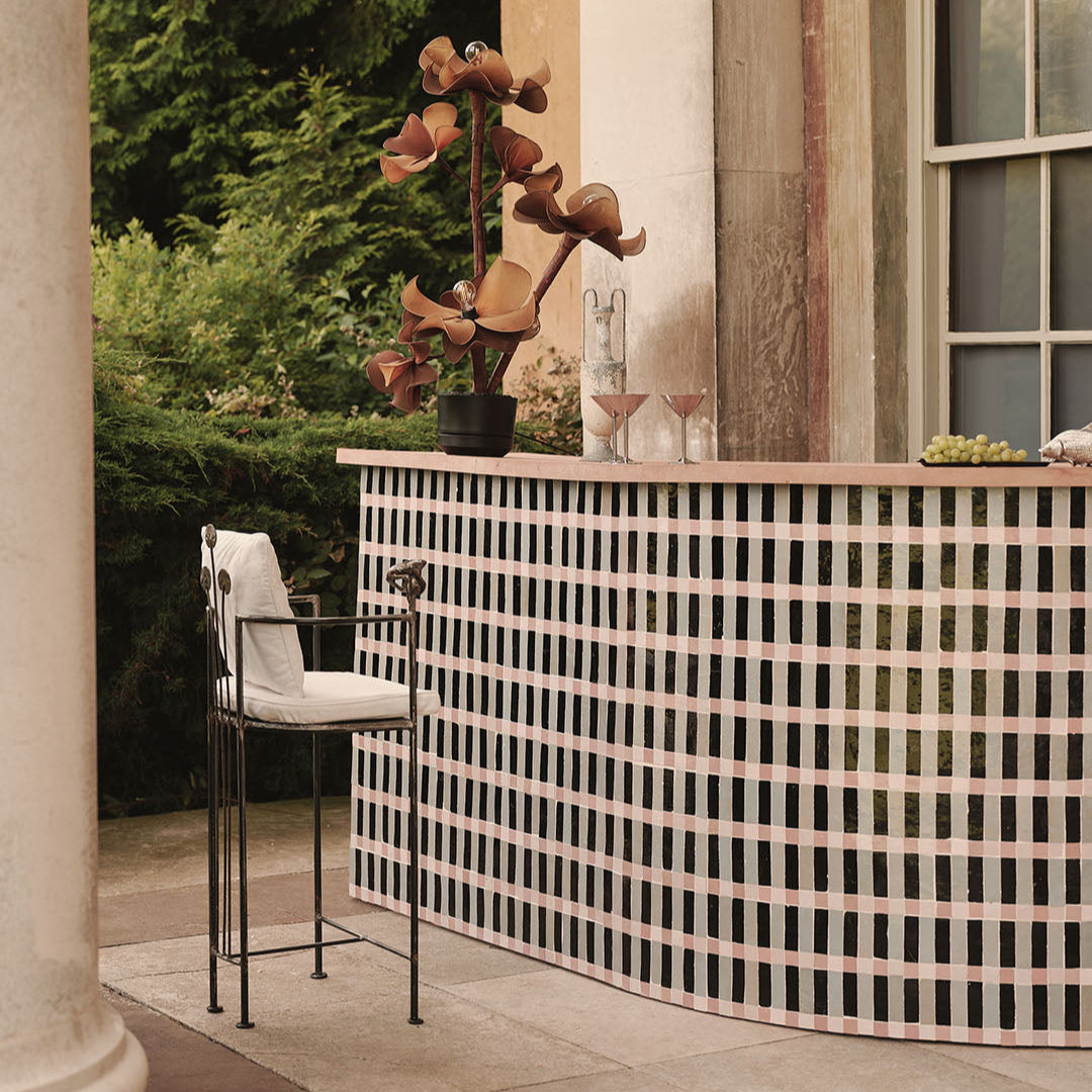 Colorful Zellige tiles arranged in grid layout