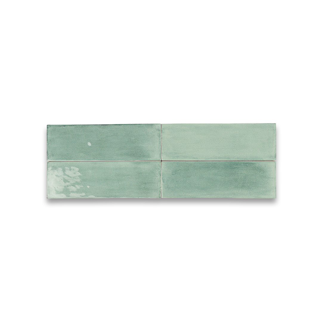 Green ceramic tile on a white background