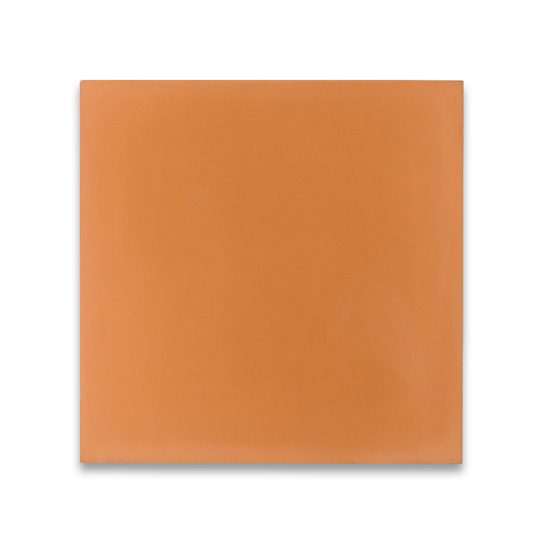 Cement tile featuring a solid melon orange color with a smooth matte finish, handcrafted surface, ideal for Mediterranean, tropical, or contemporary interior flooring and wall décor applications.