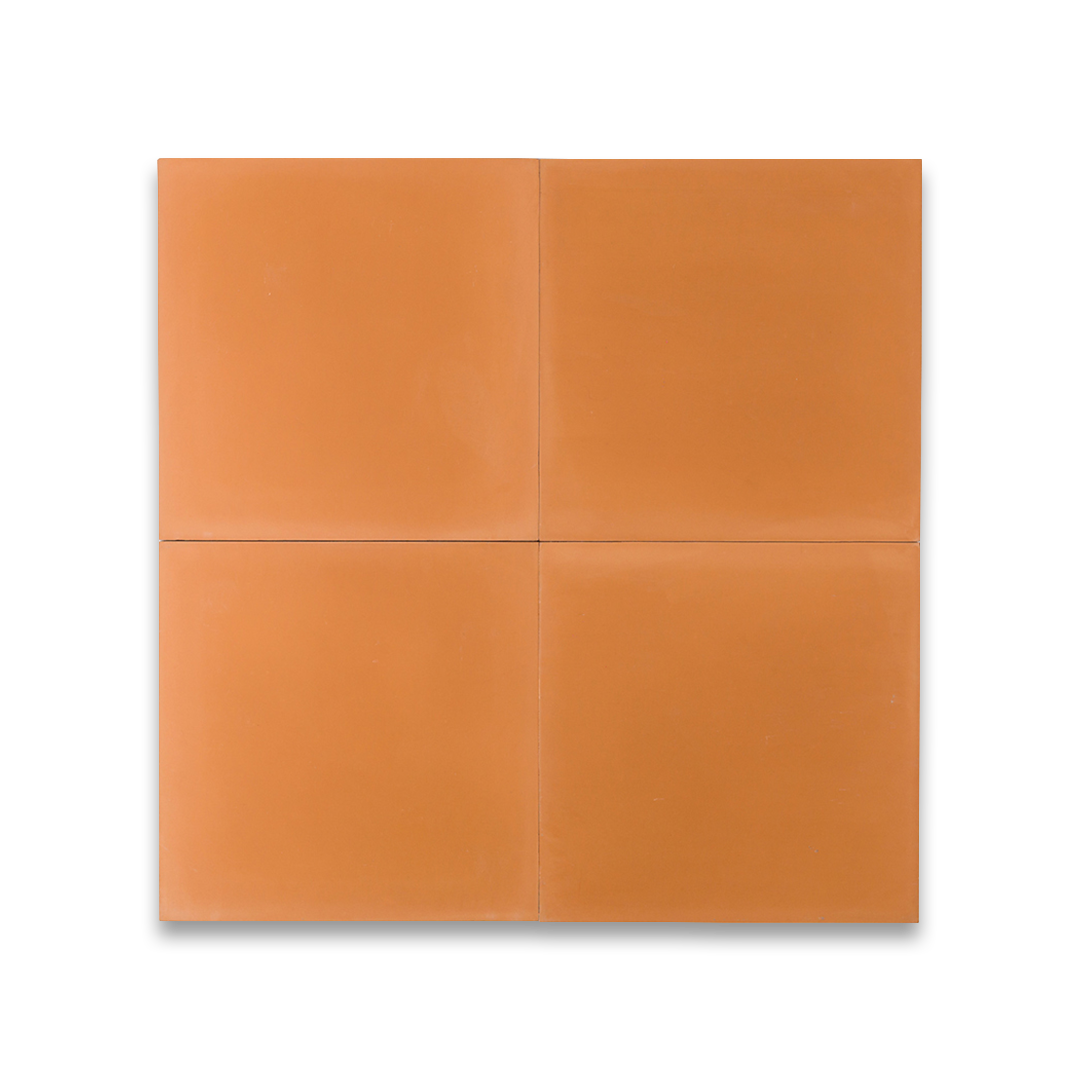 Cement tile featuring a solid melon orange color with a smooth matte finish, handcrafted surface, ideal for Mediterranean, tropical, or contemporary interior flooring and wall décor applications.