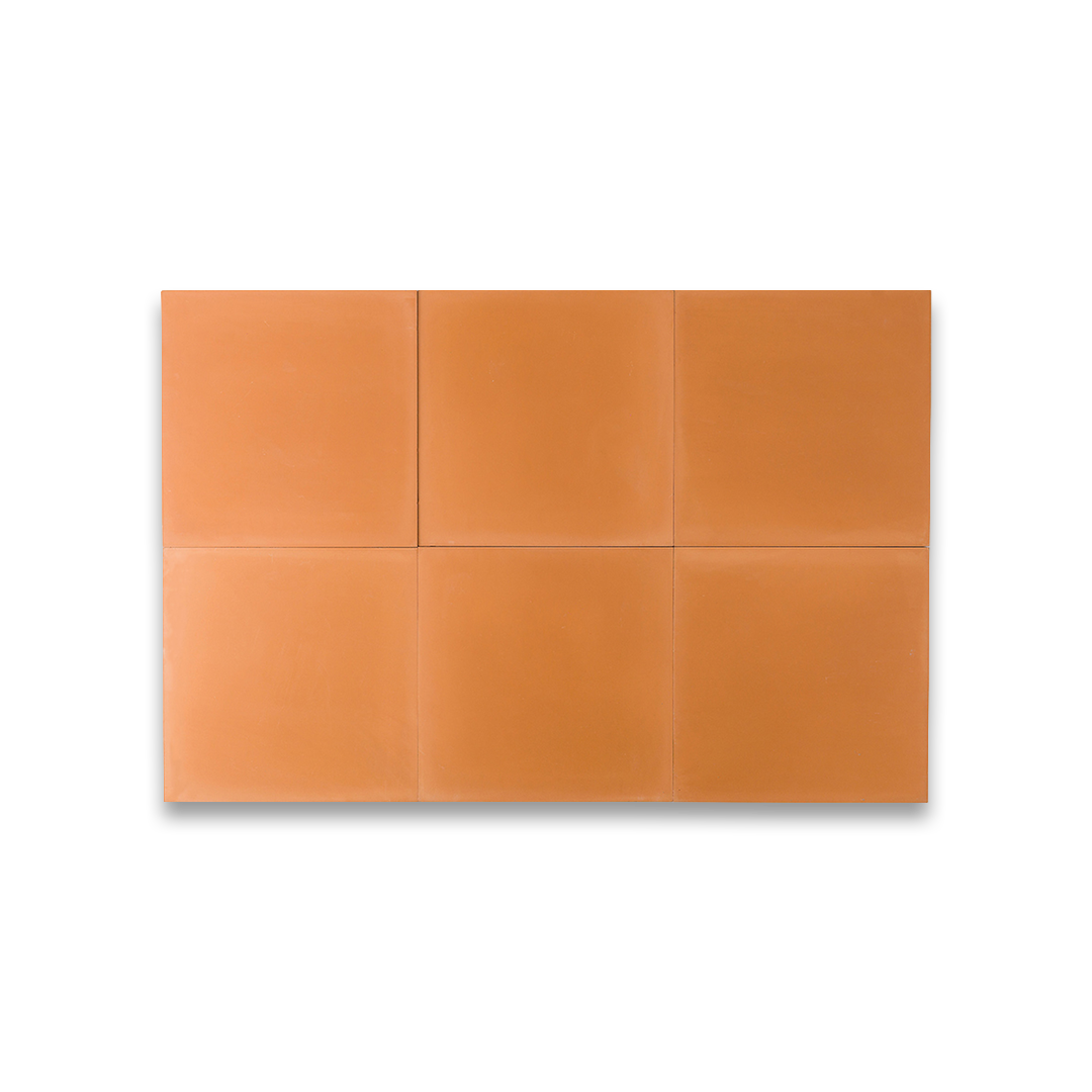 Cement tile featuring a solid melon orange color with a smooth matte finish, handcrafted surface, ideal for Mediterranean, tropical, or contemporary interior flooring and wall décor applications.