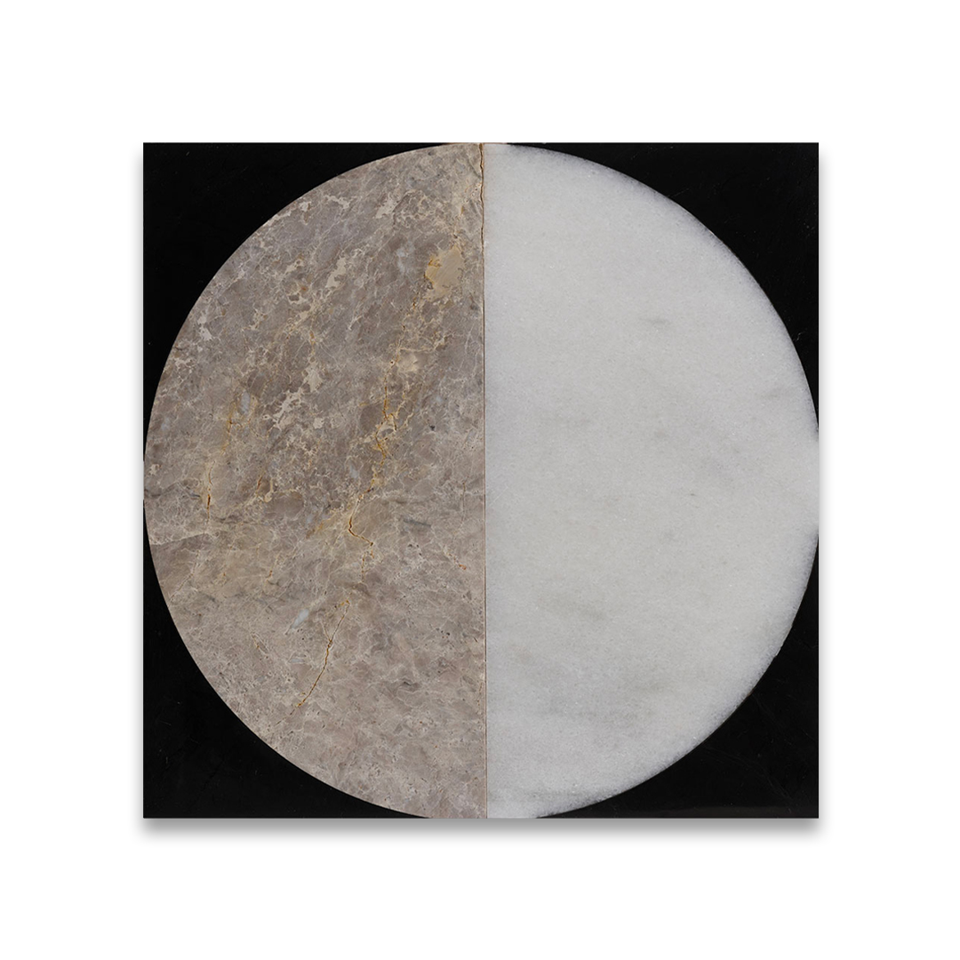 Round stone surface with two different textures, one on each half, on a black background.