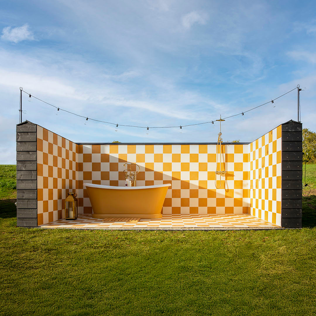 Cement tile featuring a solid warm ochre yellow tone with a smooth matte finish, handcrafted surface, ideal for Mediterranean, rustic, or contemporary interior flooring and wall décor applications.
