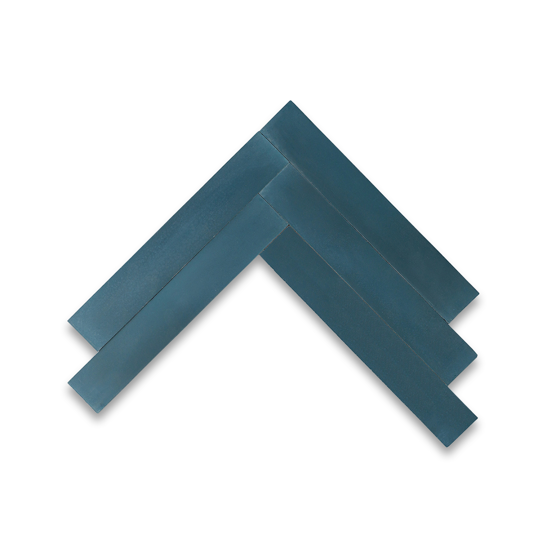 Cement tile featuring elongated rectangular strips in deep teal blue arranged in a herringbone pattern, matte finish, ideal for modern, coastal, or contemporary interior flooring and wall décor applications.
