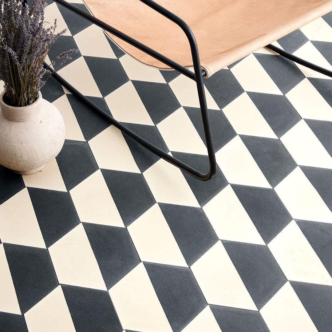 Geometric hexagonal tile featuring a bold black upper section and soft cream lower half, ideal for modern interiors, 3D wall illusions, or contemporary floor patterns.