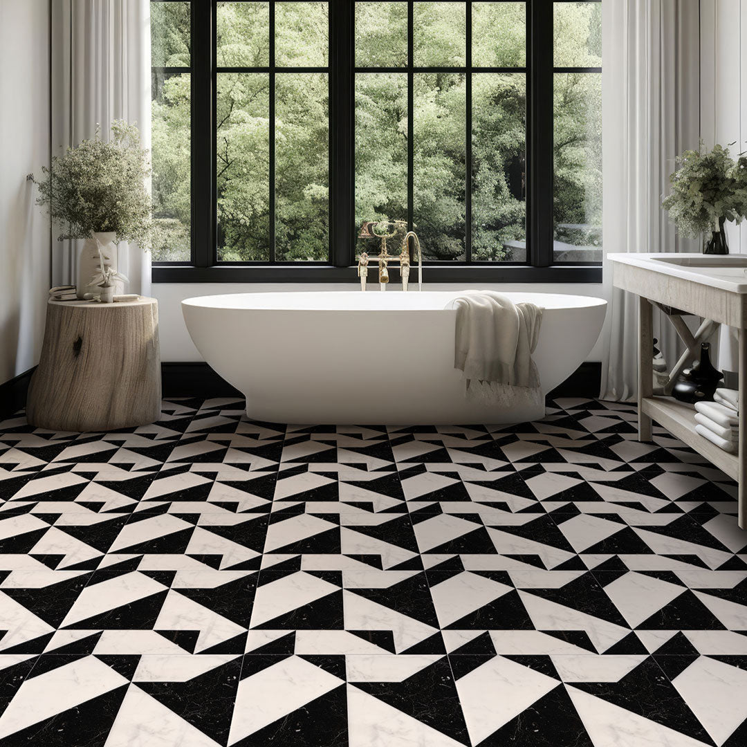 Modern bathroom with a freestanding bathtub, geometric black and white tiles, and large windows.