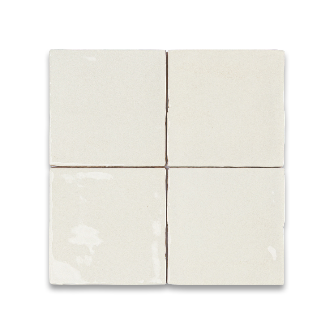 White ceramic tiles arranged in a grid pattern on a white background