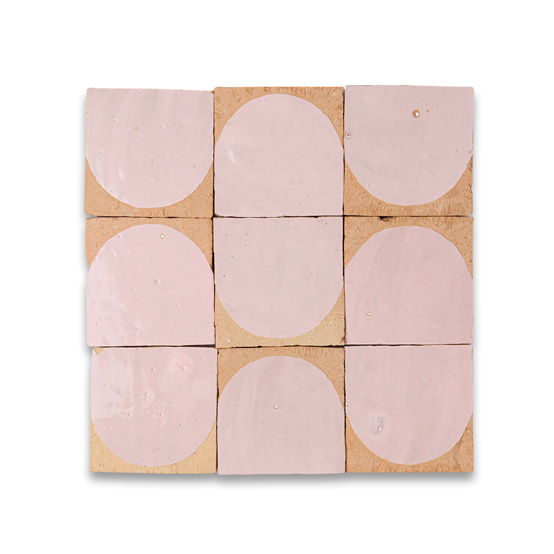 Set of pink ceramic tiles with a beige border on a white background
