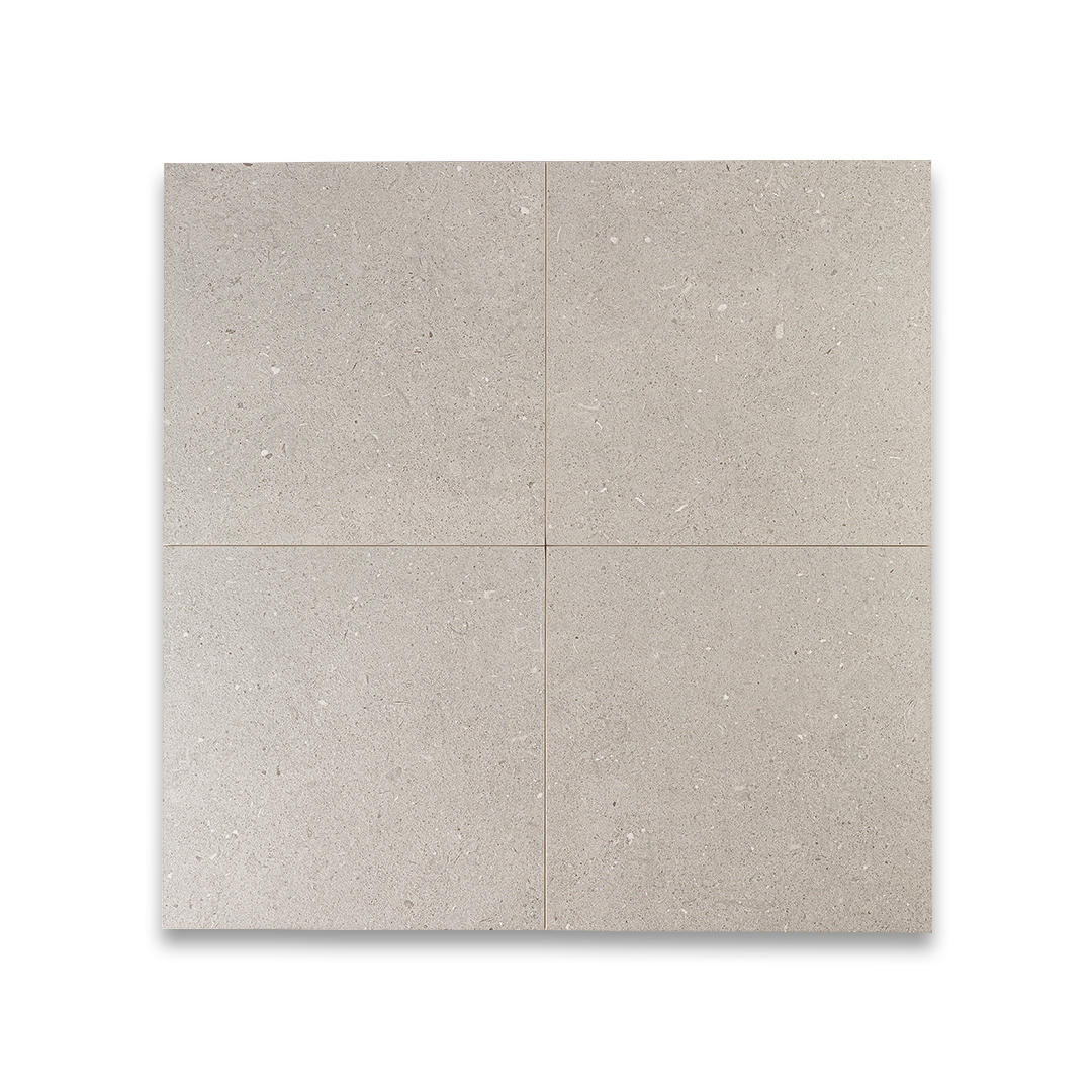 Four square tiles with a beige pattern on a white background