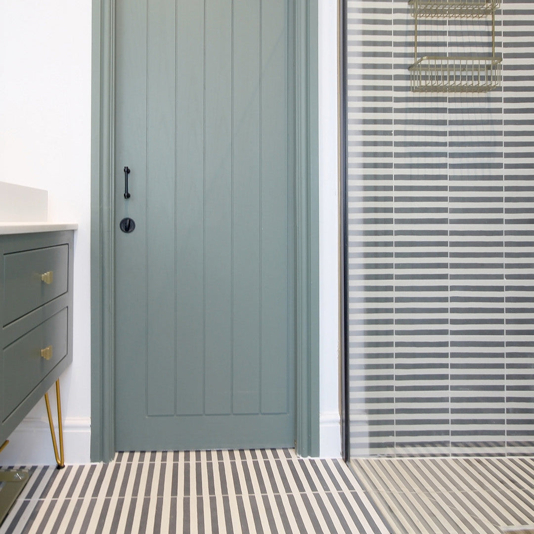 A solid dark green color with a smooth matte finish, square shape, ideal for modern, minimalist, or industrial interior flooring and wall applications.