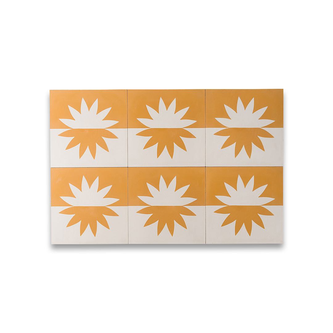 Cement tile featuring a bold geometric sunburst motif in warm ochre orange and white, matte finish, ideal for Mediterranean, bohemian, or contemporary interior flooring and wall décor applications.
