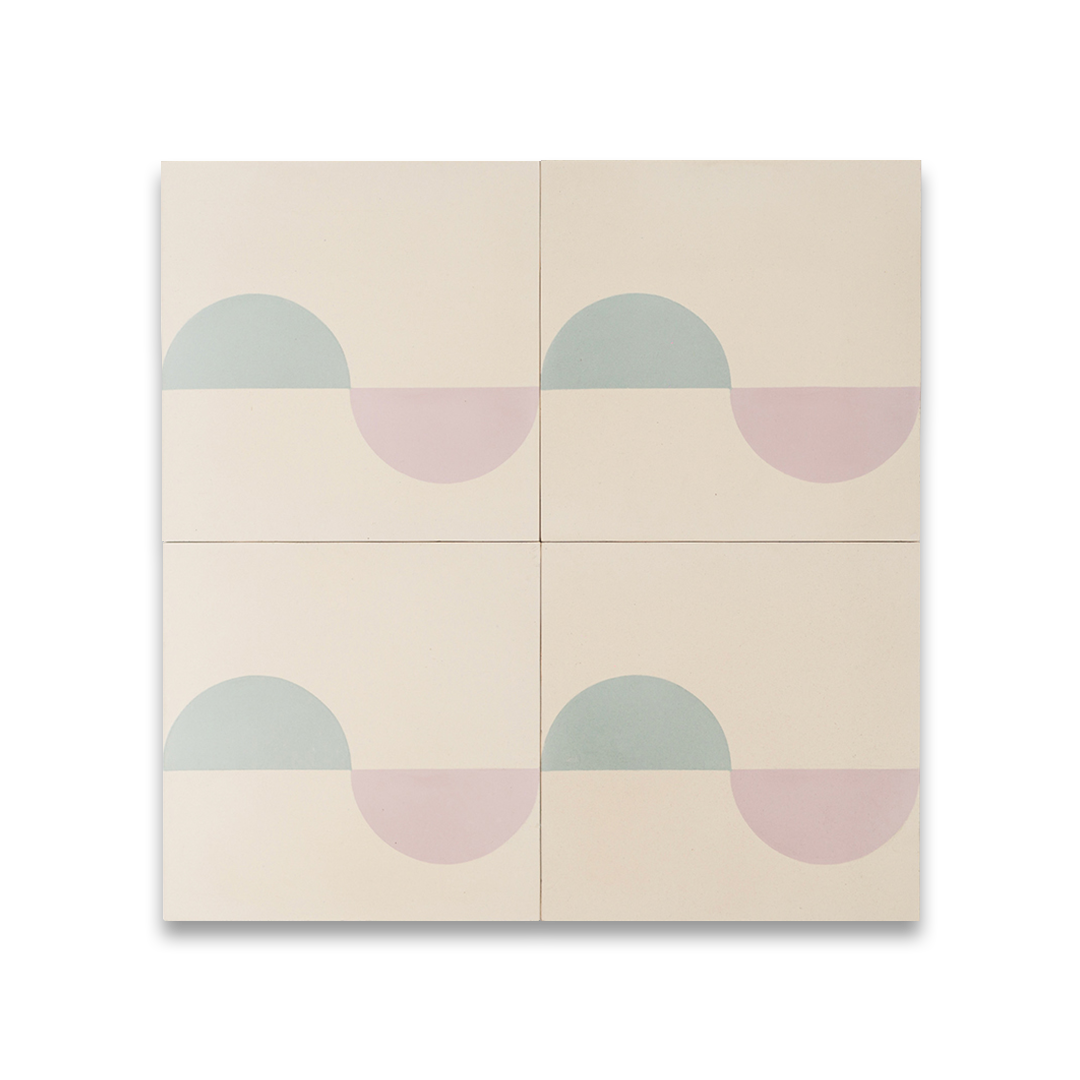 Surfside cement tile design featuring alternating pastel blue and blush pink semicircles on a cream background, forming a soft wave-like geometric pattern ideal for modern coastal interiors.
