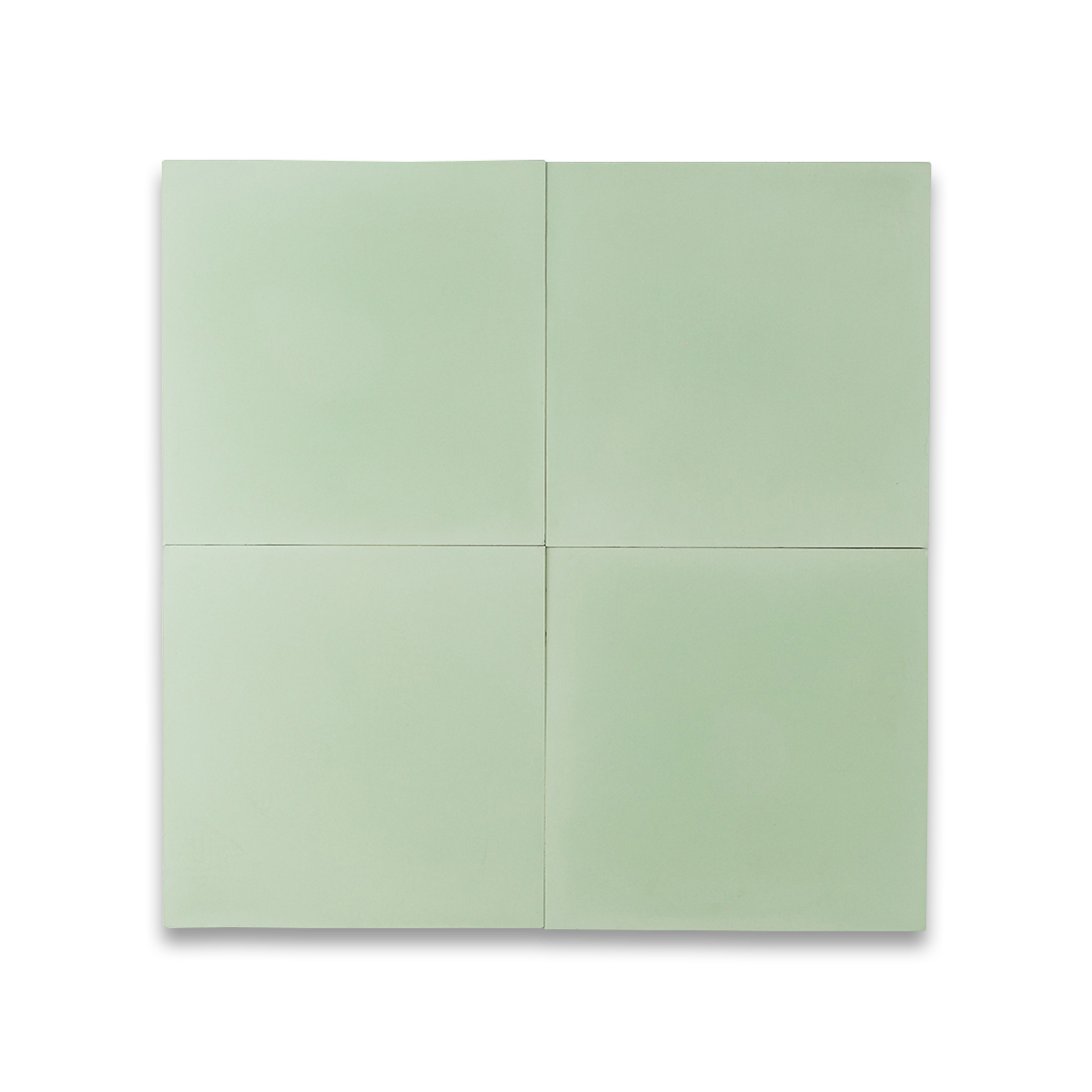 A solid pastel mint green color with a smooth matte finish, ideal for minimalist, Scandinavian, or modern interior flooring, wall cladding, and decorative design applications.