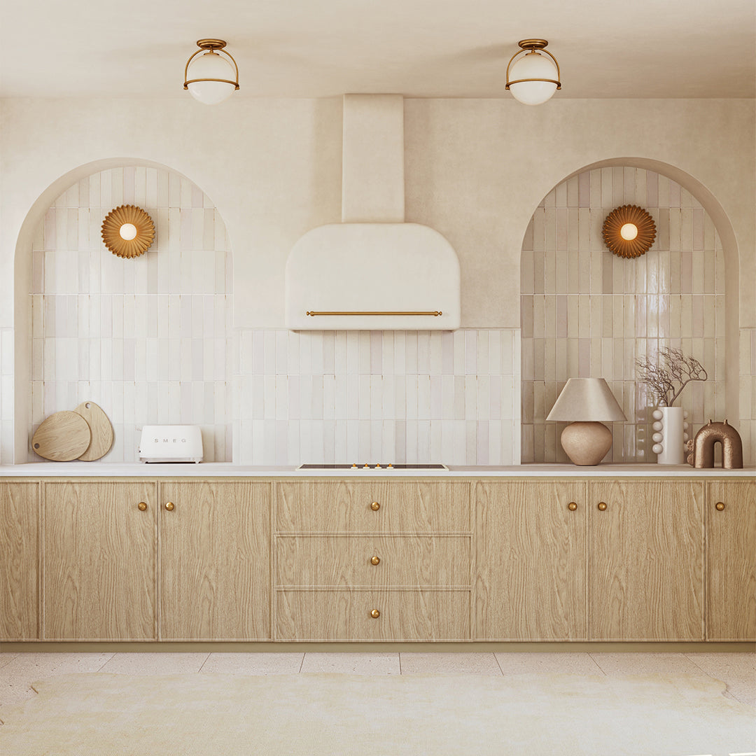 Modern kitchen with wooden cabinets, white appliances, and decorative elements.