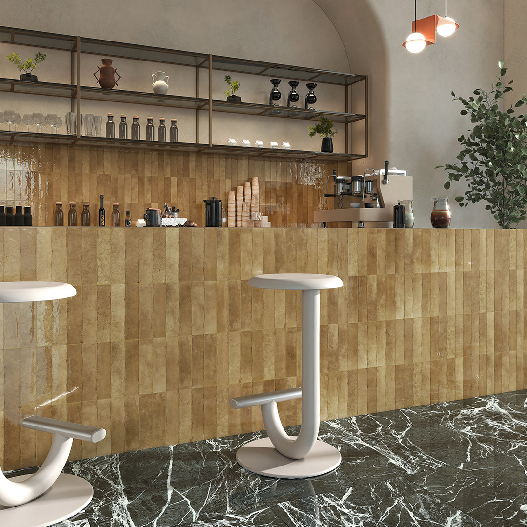 Modern bar area with marble countertop and wooden tiled wall.