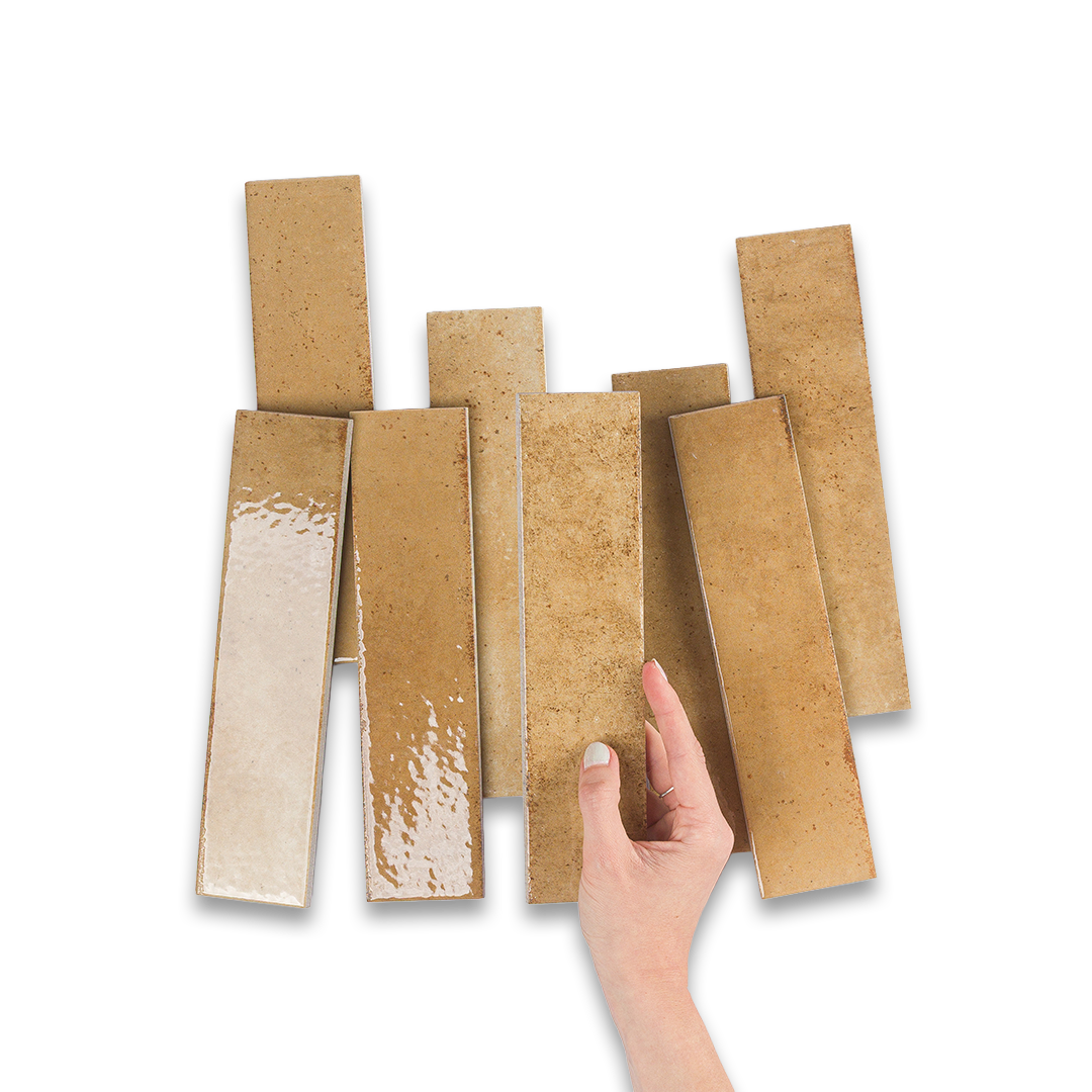 Set of cork strips with a hand pointing to one of them on a white background