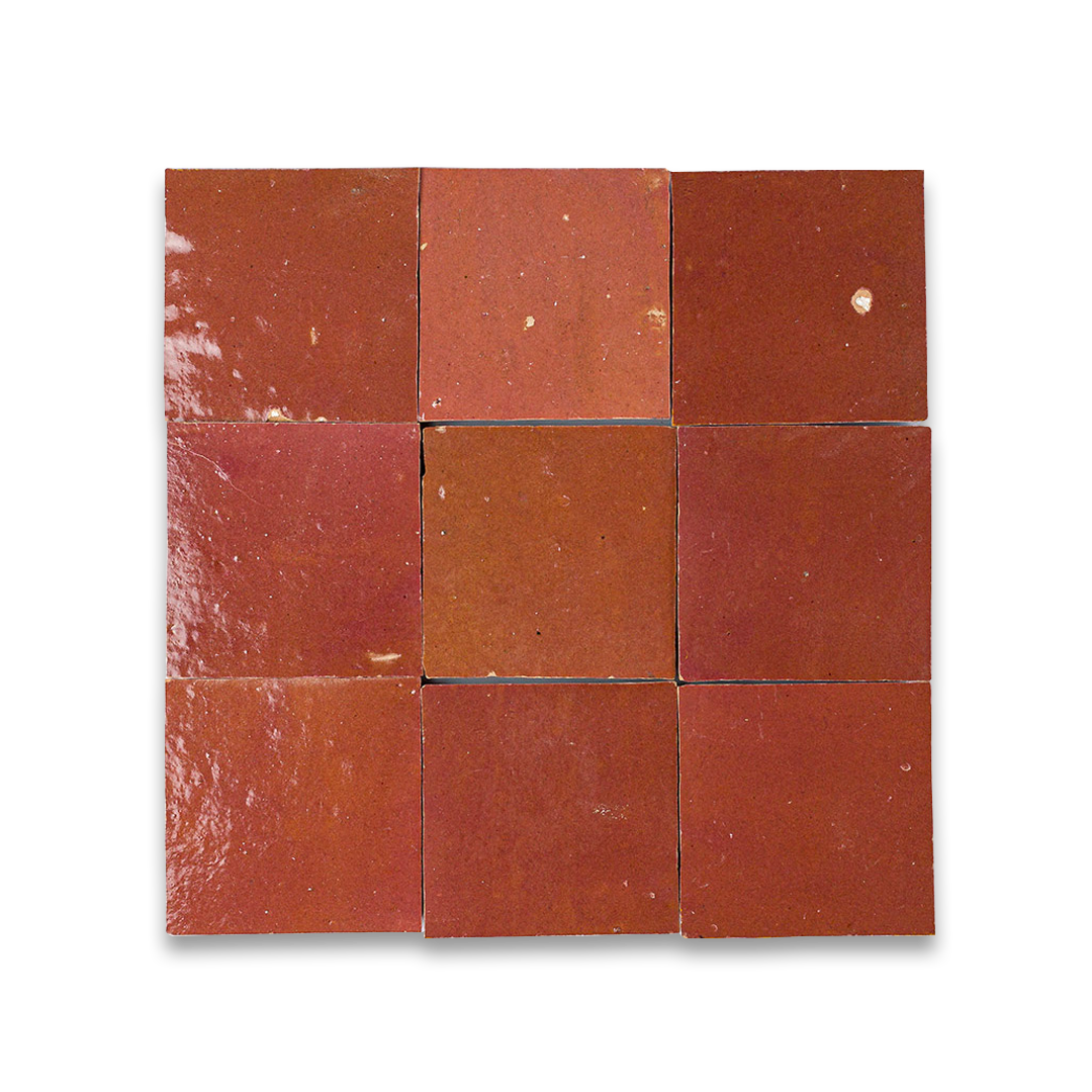 Nine square red tiles arranged in a 3x3 grid on a white background