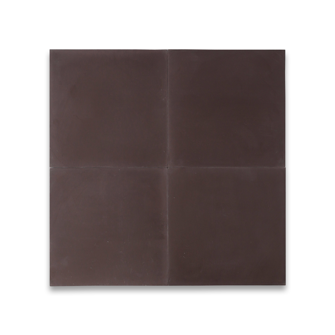 A solid dark brown color with a smooth matte finish, square shape, ideal for rustic, industrial, or modern interior flooring and wall design applications.